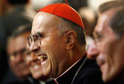A smiling Cardinal Bertone